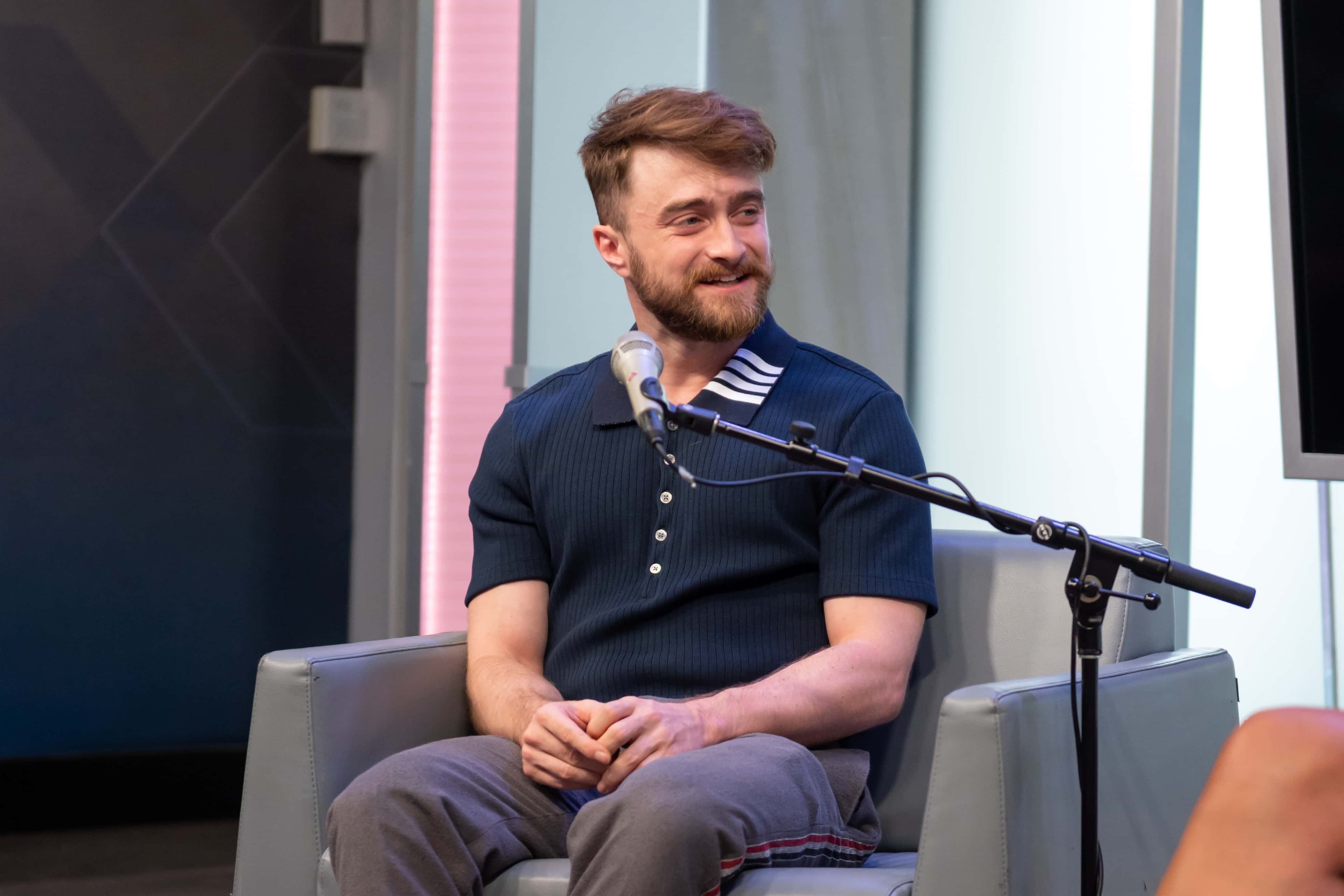 NEW YORK, NEW YORK - AUGUST 18: Daniel Radcliffe talks to host Hoda Kotb at SiriusXM's studios on Au