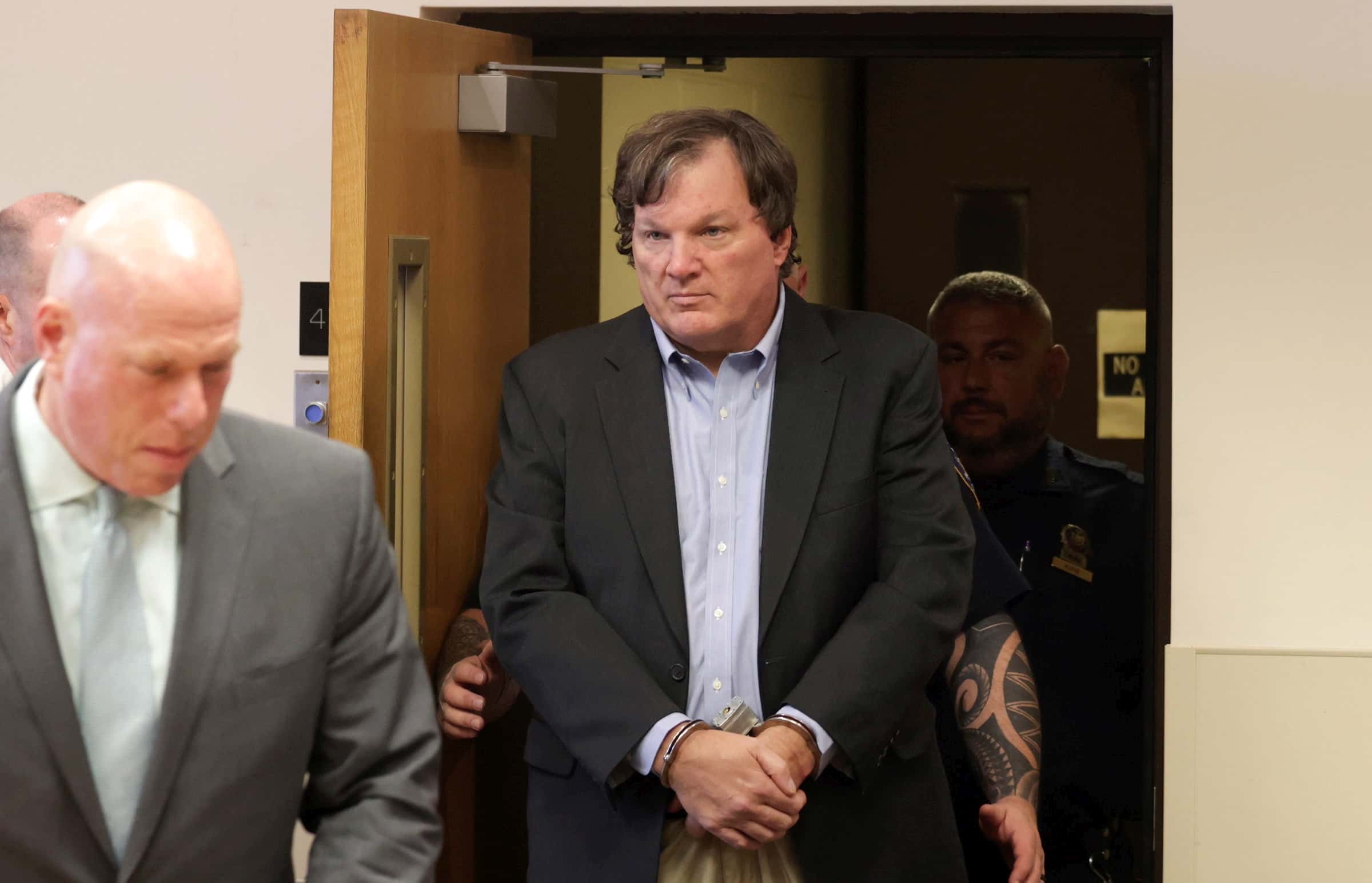 Rex A. Heuermann appears before Judge Timothy P. Mazzei in Suffolk County Court on August 1, 2023 in Central Islip, New York. Heuermann's arrest comes more than a decade after the disappearance of four women whose bodies were found within a quarter mile of each other wrapped in hunting camouflage burlap along remote Gilgo Beach on Long Island's South Shore. Beside the three women Heuermann is charged with killing, he is a suspect in the fourth, according to public reports citing the Suffolk County district attorney's office.