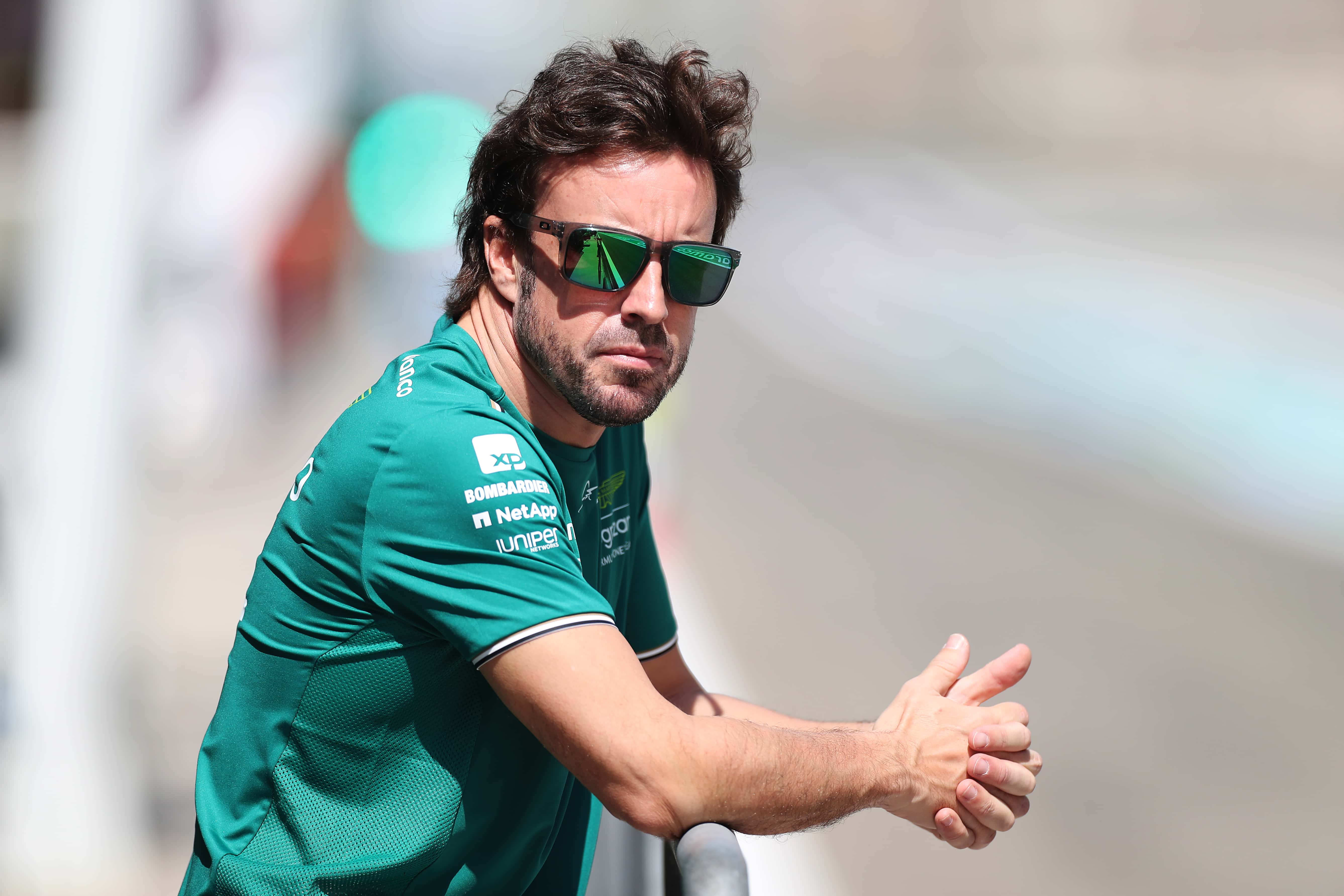  Fernando Alonso of Spain and Aston Martin F1 Team looks on in the Pitlane during day three of F1 Testing at Bahrain International Circuit on February 25, 2023 in Bahrain, Bahrain. (Photo by Peter Fox/Getty Images)