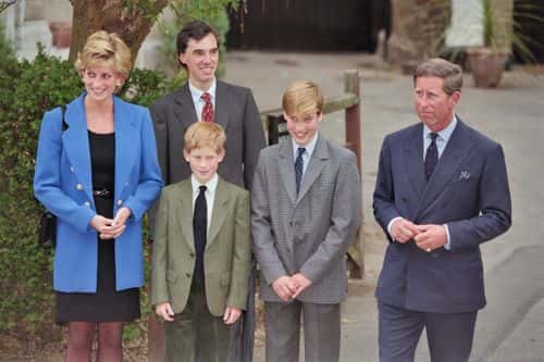 British Royal Diana, Princess of Wales (1961-1997), wearing a blue jacket over a black dress, with Eton housemaster Dr Andrew Gailey, Prince Harry, Prince William, and Prince Charles outside Manor House on Prince William's first day at Eton College in Eton, Berkshire, England, 6th September 1995. (Photo by Princess Diana Archive/Hulton Archive/Getty Images)