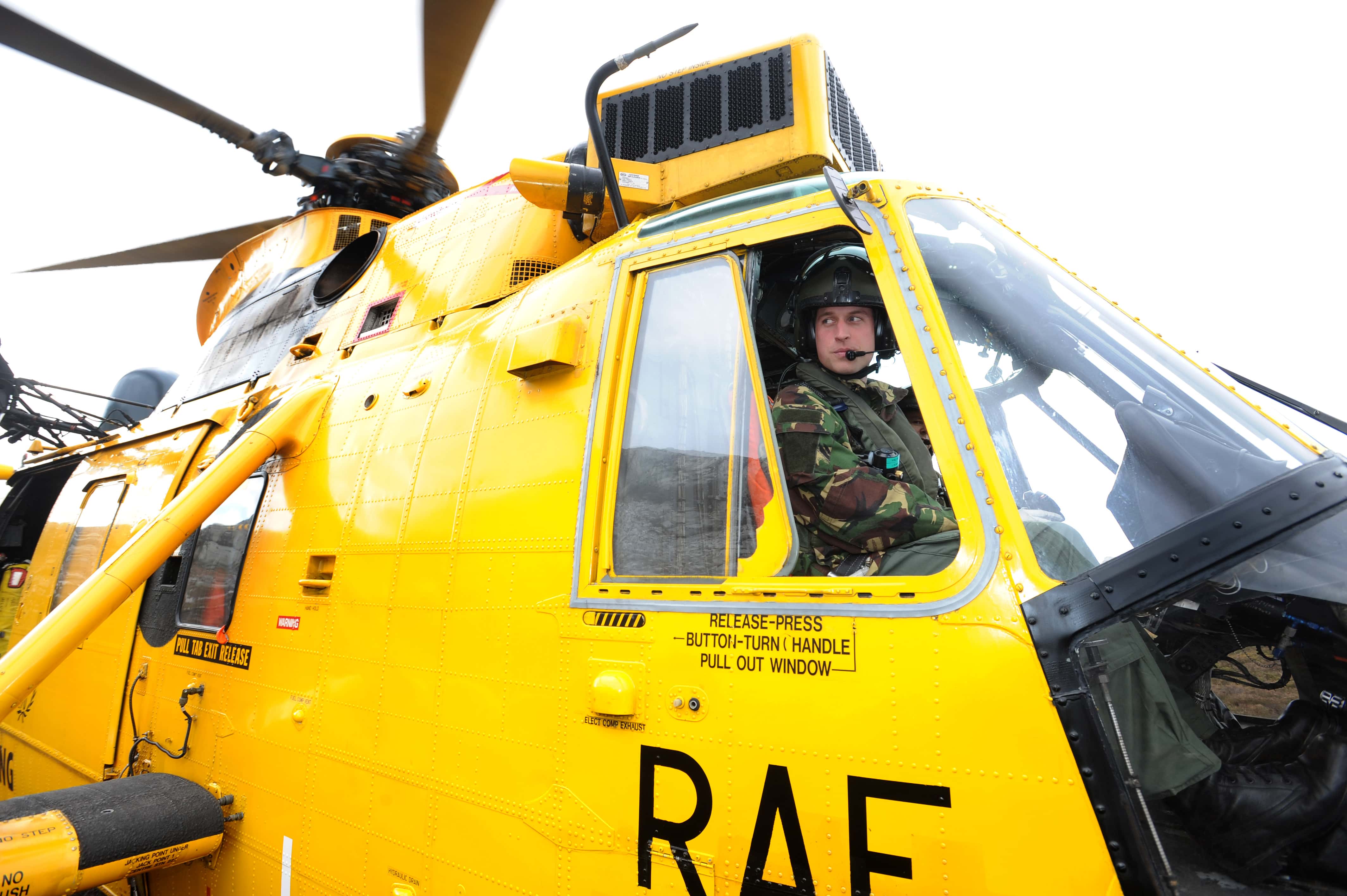 Prince William at the controls of a Sea King helicopter during a training exercise at Holyhead Mountain, having flown from RAF Valley on March 31, 2011 in in Anglesey, north Wales.