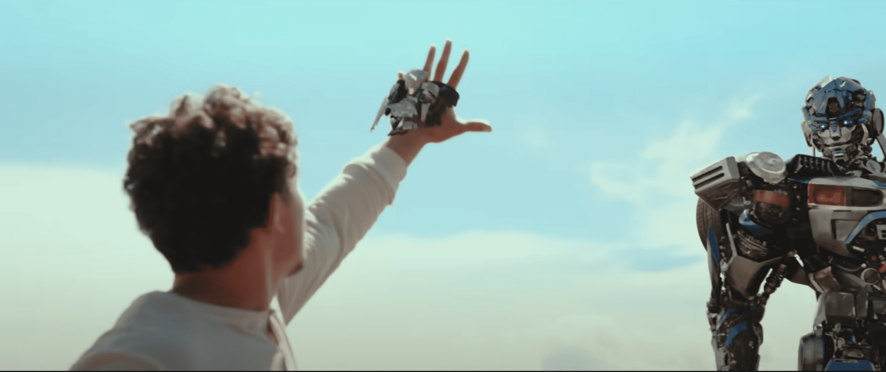 Nate Diaz receives a weapon from Mirage in 'Transformers: Rise of the Beasts' (YouTube/@ParamountPictures)