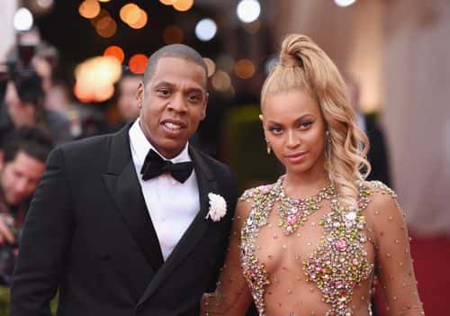 Jay Z (L) and Beyonce attend the 