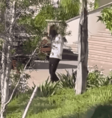 Polo G, 24, was placed in cuffs early on Ausgust 23 outside his home (@ReactingYT/Youtube)