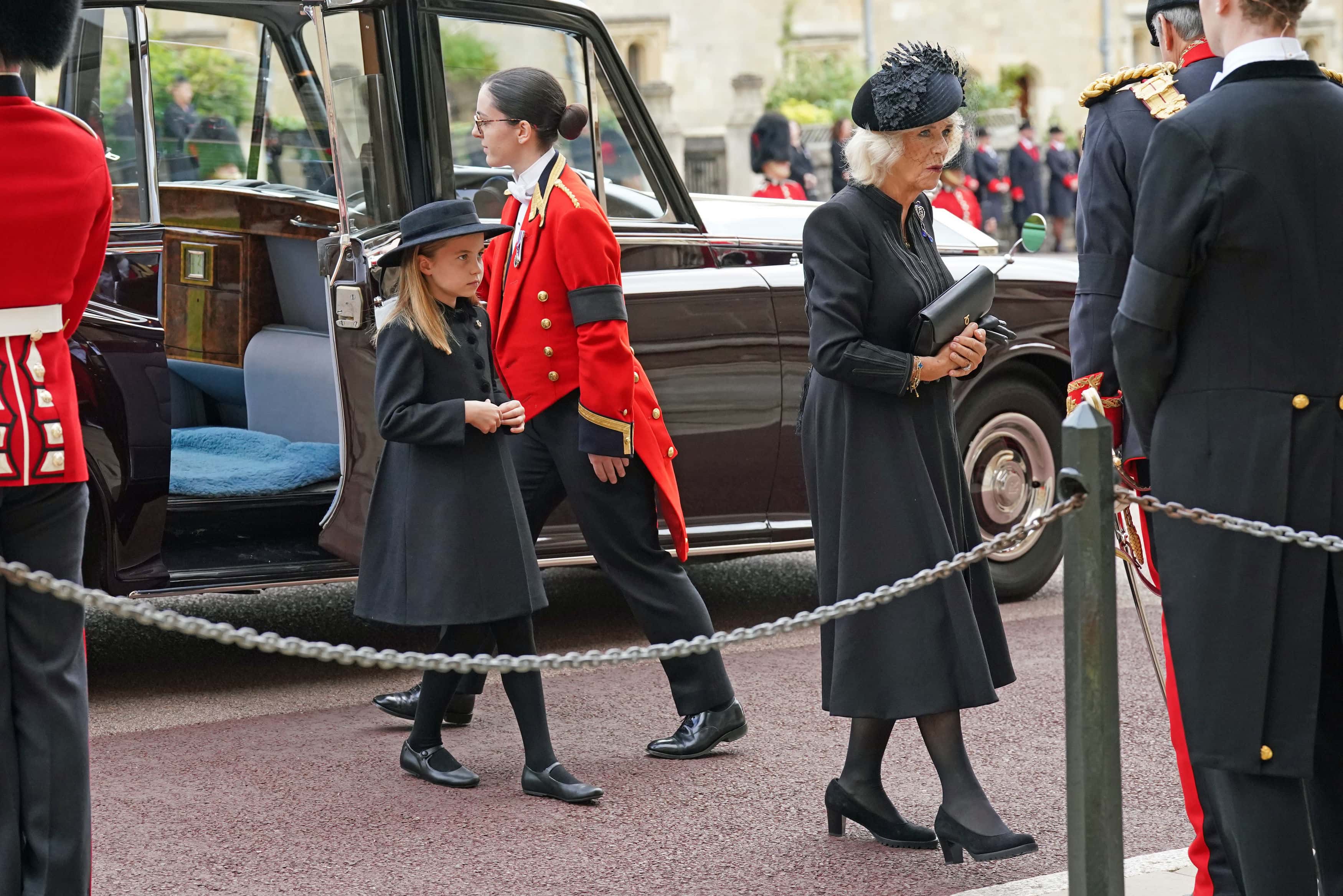 Camilla, The Queen Consort and Princess Charlotte arrive at the Committal Service for Queen Elizabeth II held at St George's Chapel in Windsor Castle on September 19, 2022 in Windsor, England. The committal service at St George's Chapel, Windsor Castle, took place following the state funeral at Westminster Abbey. A private burial in The King George VI Memorial Chapel followed. Queen Elizabeth II died at Balmoral Castle in Scotland on September 8, 2022, and is succeeded by her eldest son, King Charles III.