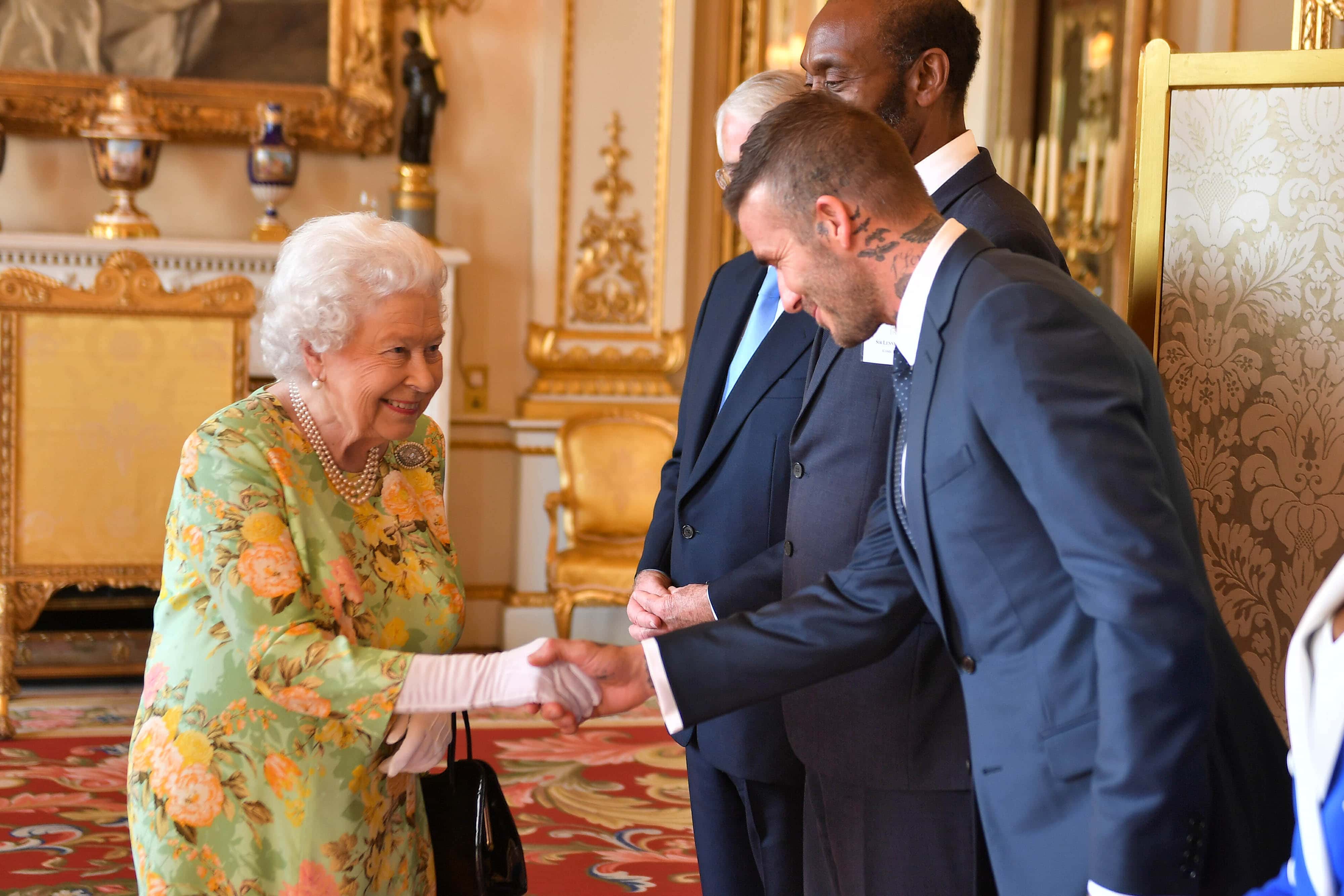 Queen Elizabeth II meets David Beckham at Buckingham Palace on June 26, 2018 in London, England. The Queen's Young Leaders Programme, now in its fourth and final year, celebrates the achievements of young people from across the Commonwealth working to improve the lives of people across a diverse range of issues including supporting people living with mental health problems, access to education, promoting gender equality, food scarcity and climate change.