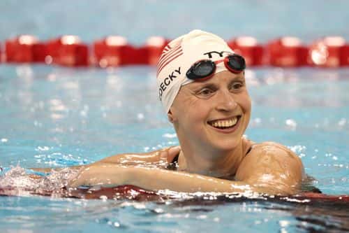 Katie Ledecky of the United States reacts after setting a world record and winning the Woman's 1500m Final during day two of the FINA Swimming World Cup at the Pan Am Sports Centre on October 28, 2022 in Toronto, Ontario.