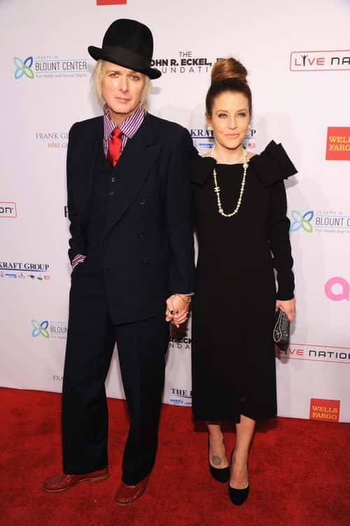 Michael Lockwood and Lisa Marie Presley attend the Elton John AIDS Foundation's 12th Annual An Enduring Vision Benefit at Cipriani Wall Street on October 15, 2013 in New York City.
