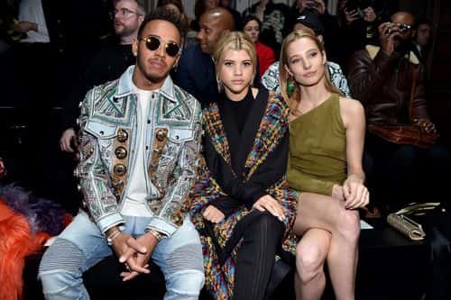 (L-R) Formula One driver, Lewis Hamilton, Sofia Richie and Ilona Smet attend the Balmain Menswear Fall/Winter 2017-2018 show as part of Paris Fashion Week on January 21, 2017 in Paris, France.