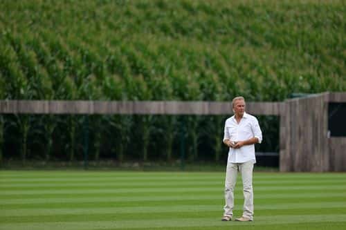 Actor Kevin Costner walks onto the field prior to a game between the Chicago White Sox and the New York Yankees at the Field of Dreams on August 12, 2021 in Dyersville, Iowa.