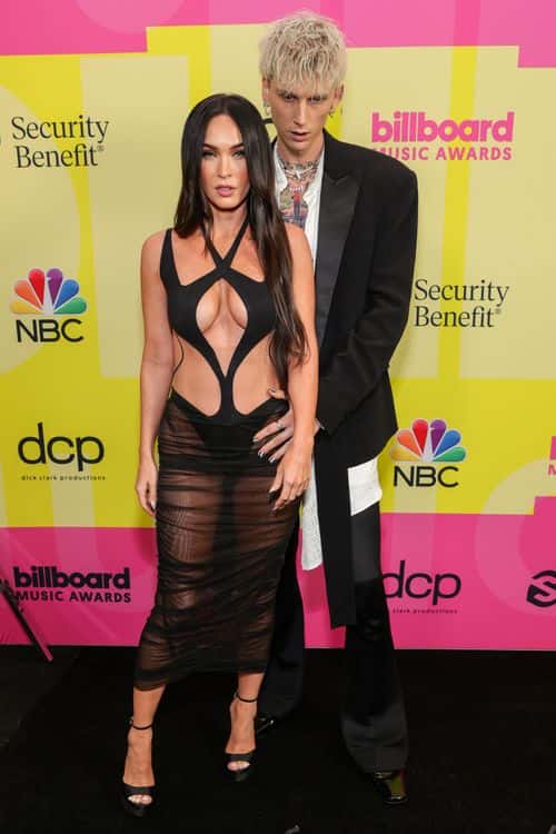 Megan Fox and Machine Gun Kelly poses backstage for the 2021 Billboard Music Awards, broadcast on May 23, 2021 at Microsoft Theater in Los Angeles, California. (Photo by Rich Fury/Getty Images for dcp)