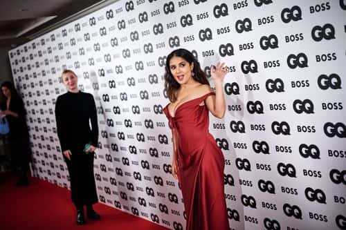 The 56-year-old opted for minimal accessories, as she allowed the floor-length gown to be the star of the evening. (Getty Images)