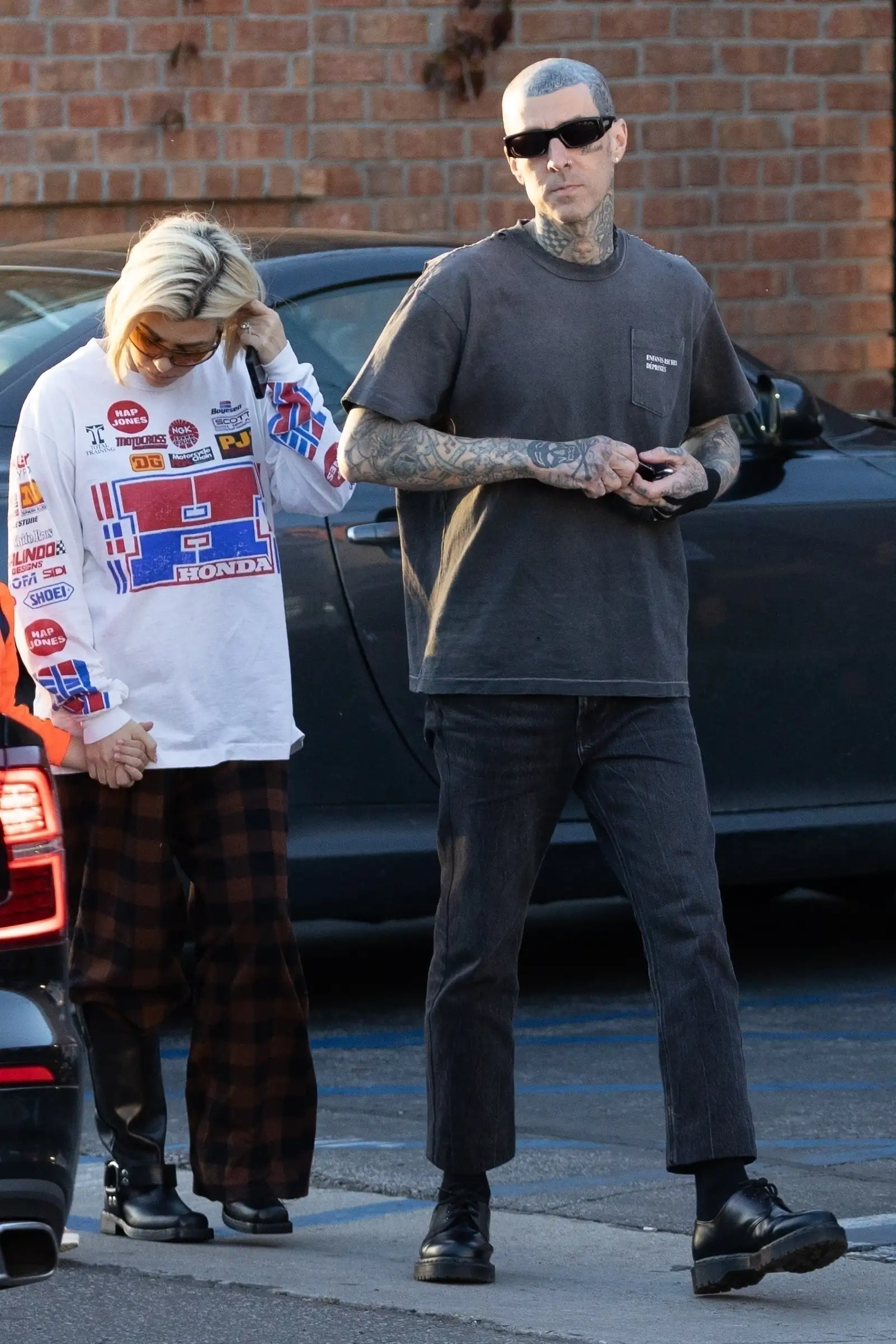 reality star, 43, cut a casual figure alongside her rocker spouse, 47 to join him at his vegan restaurant Crossroads Kitchen in Calabasas, Los Angeles (Backgrid)