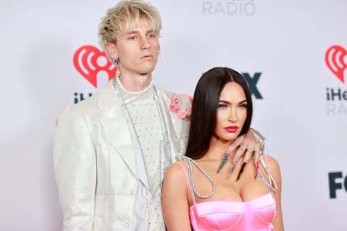 (EDITORIAL USE ONLY) (L-R) Machine Gun Kelly and Megan Fox attend the 2021 iHeartRadio Music Awards at The Dolby Theatre in Los Angeles, California, which was broadcast live on FOX on May 27, 2021.