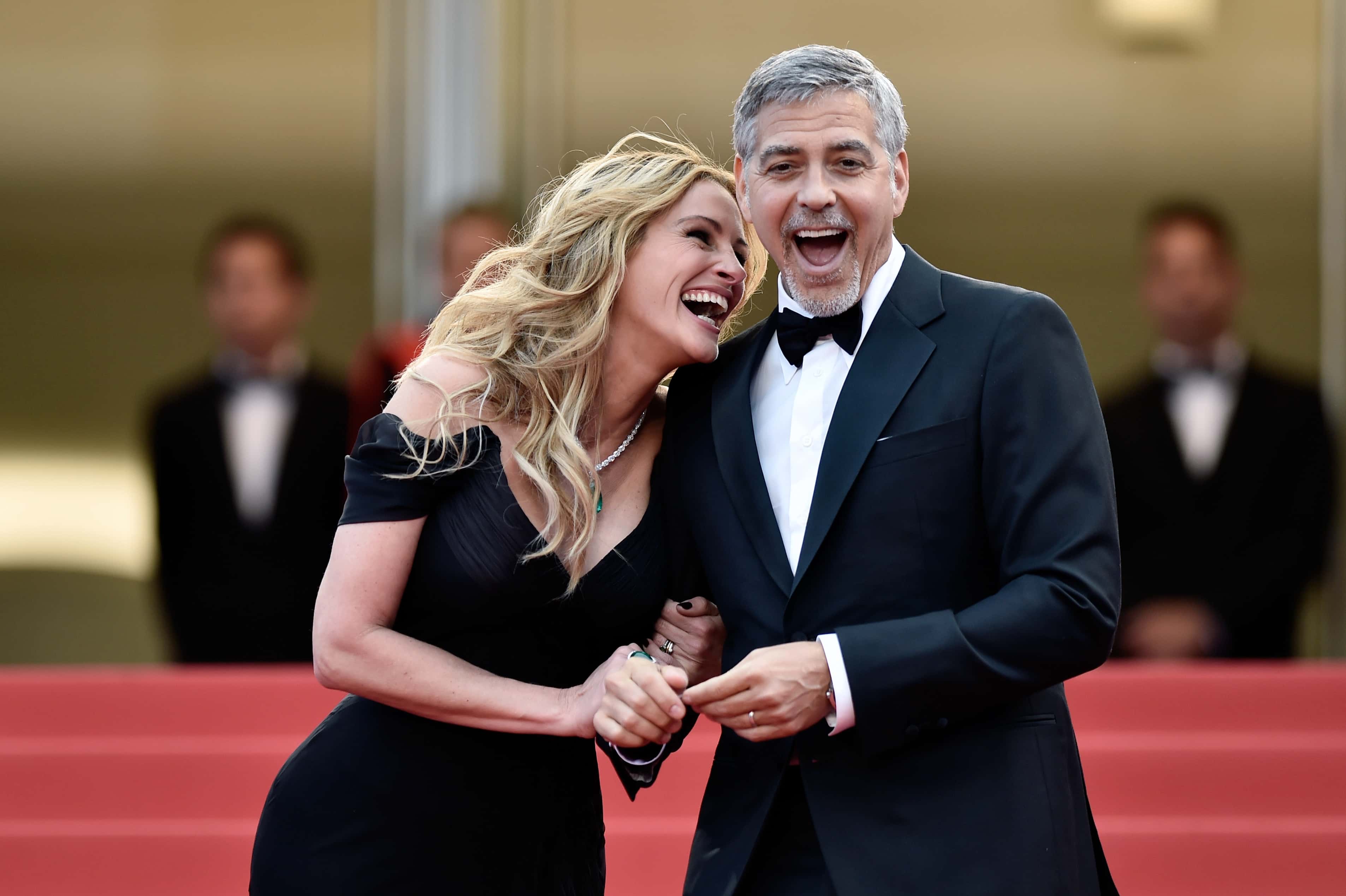 Actors Julia Roberts and George Clooney attend the