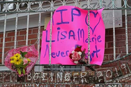 Signs placed by fans outside Graceland to pay their respects to Lisa Marie Presley on January 13, 2023 in Memphis, Tennessee.