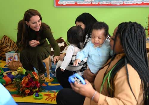 Catherine, Princess of Wales talks with parents and children during her visit to Colham Manor Children's Centre in Hillingdon with the Maternal Mental Health Alliance on November 9, 2022 in Uxbridge, England. (Photo by Daniel Leal - WPA Pool/Getty Images)