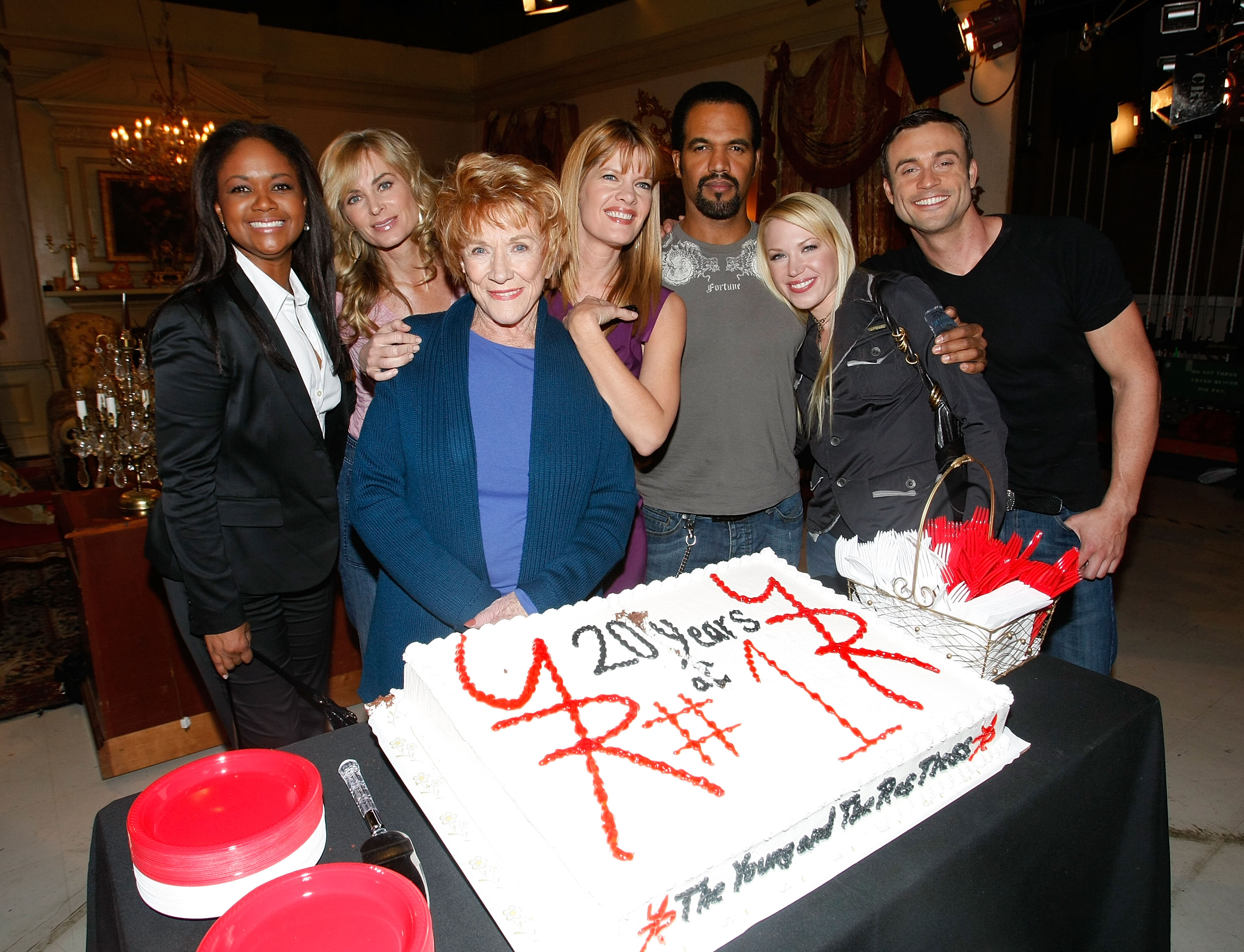 (L-R) Cast members of 'The Young and the Restless' actors Tonya Lee Williams, Eileen Davidson, Jeanne Cooper, Michelle Stafford, Kristoff St. John, Adrienne Frantz and Daniel Godbard attend the cake cutting ceremony celebrating 'The Young and the Restless' staying the number one rated daytime drama series for twenty years straight at CBS Studios on December 11, 2008 in Los Angeles, California. (Getty)