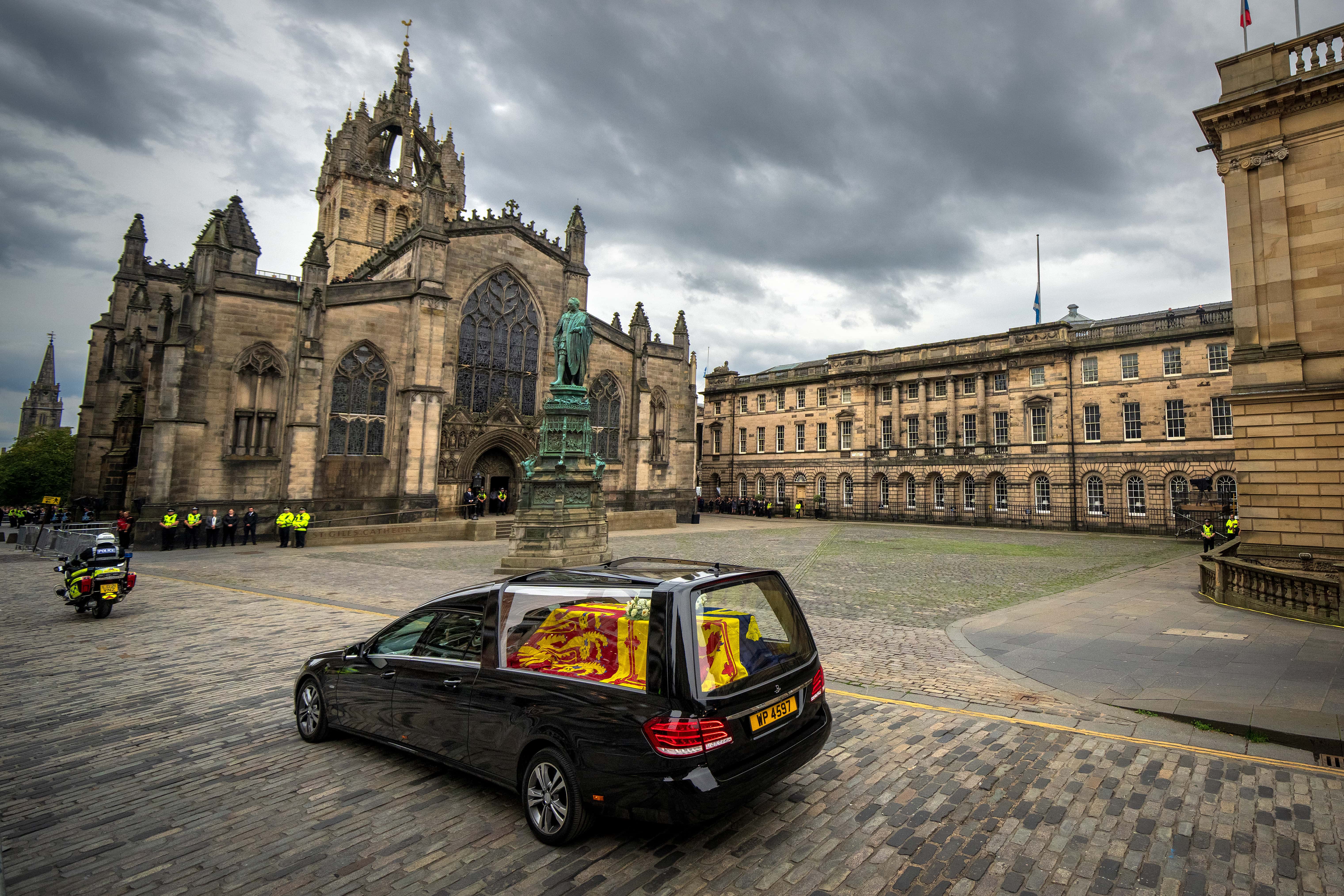 The cortege carrying the coffin of the late Queen Elizabeth II passes St Giles' Cathedral on its way to Palace of Holyroodhouse on September 11, 2022 in Edinburgh, United Kingdom. Elizabeth Alexandra Mary Windsor was born in Bruton Street, Mayfair, London on 21 April 1926. She married Prince Philip in 1947 and ascended the throne of the United Kingdom and Commonwealth on 6 February 1952 after the death of her Father, King George VI. Queen Elizabeth II died at Balmoral Castle in Scotland on September 8, 2022, and is succeeded by her eldest son, King Charles III.