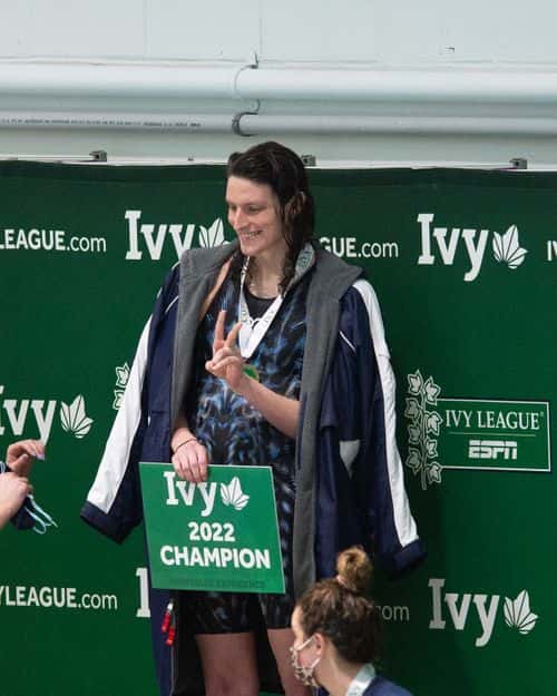 University of Pennsylvania swimmer Lia Thomas poses on the podium after winning the 100 yard freestyle during the 2022 Ivy League Womens Swimming and Diving Championships at Blodgett Pool on February 19, 2022 in Cambridge, Massachusetts.