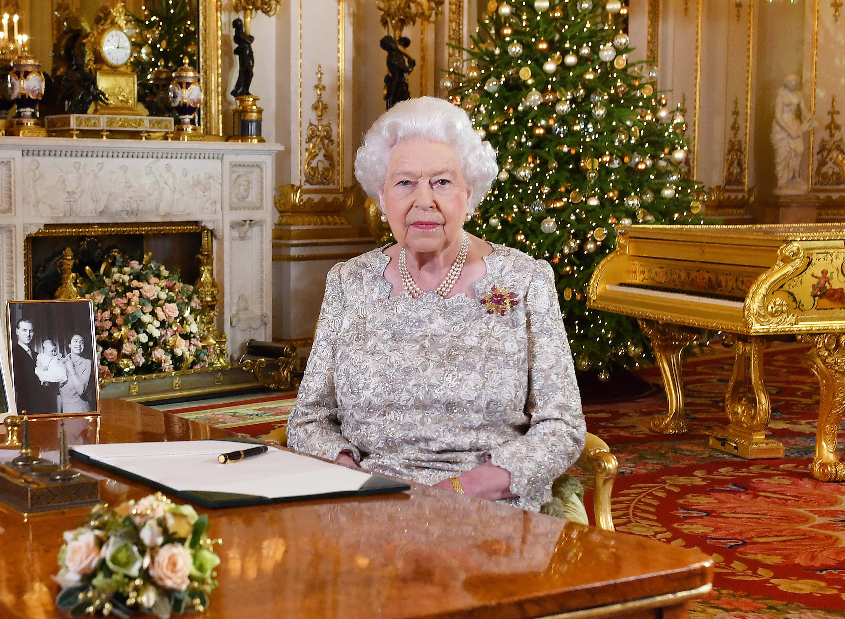 Queen Elizabeth II poses for a photo after she recorded her annual Christmas Day message, in the White Drawing Room at Buckingham Palace in a picture released on December 24, 2018 in London, United Kingdom.