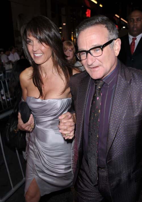 Actor Robin Williams (R) and Susan Schneider arrive at the premiere of Walt Disney Pictures' 