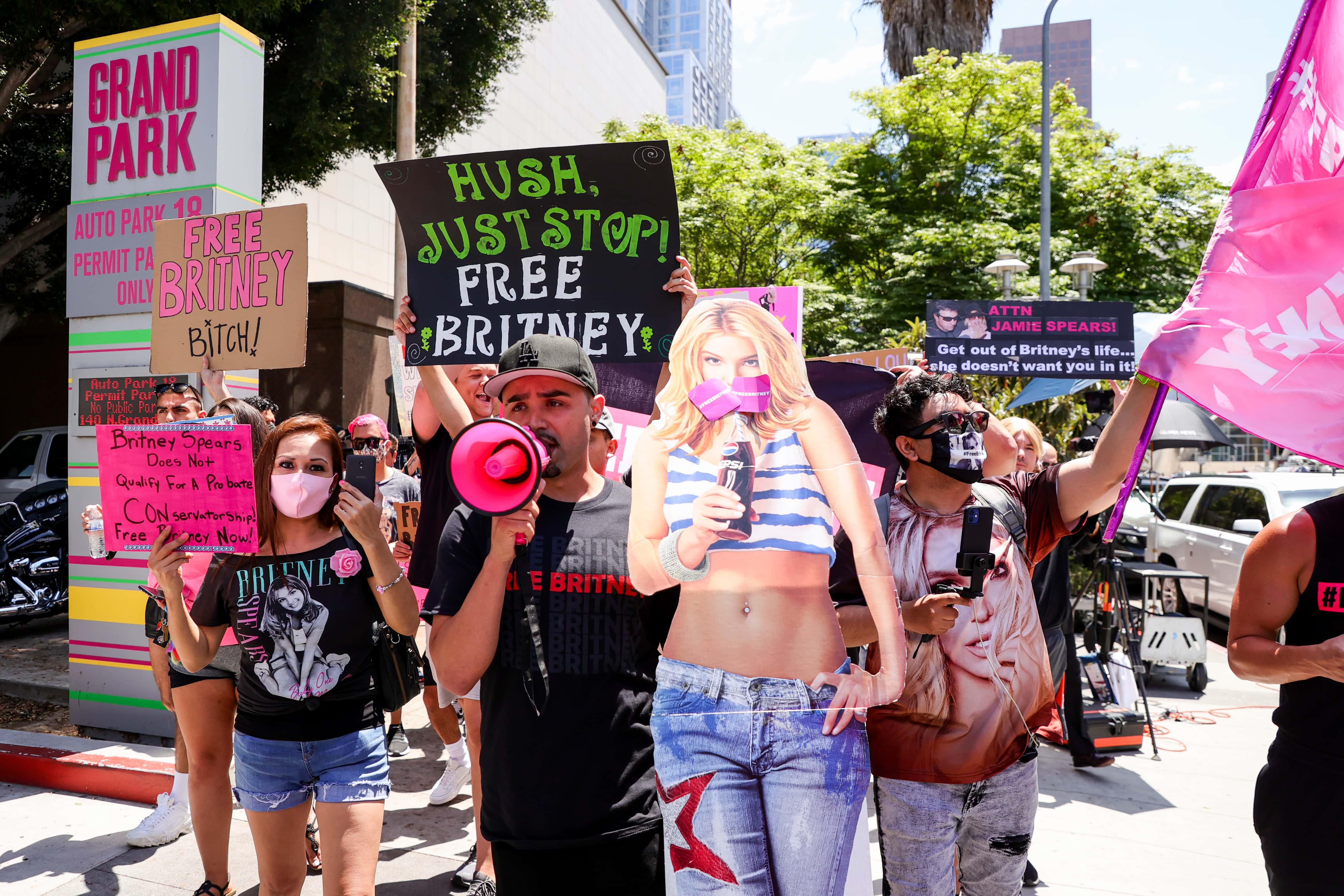 #FreeBritney activists protest at Los Angeles Grand Park during a conservatorship hearing for Britney Spears on June 23, 2021 in Los Angeles, California. Spears is expected to address the court remotely. Spears was placed in a conservatorship managed by her father, Jamie Spears, and an attorney, which controls her assets and business dealings, following her involuntary hospitalization for mental care in 2008.