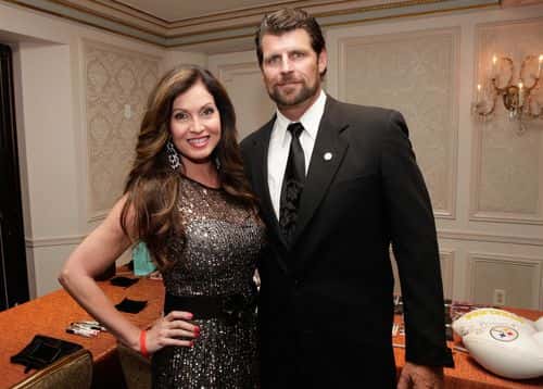 Former baseball player Scott Erickson (R) and Lisa Guerrero attend the 29th Annual Great Sports Legends Dinner to benefit The Buoniconti Fund to Cure Paralysis at The Waldorf Astoria on September 29, 2014 in New York City.