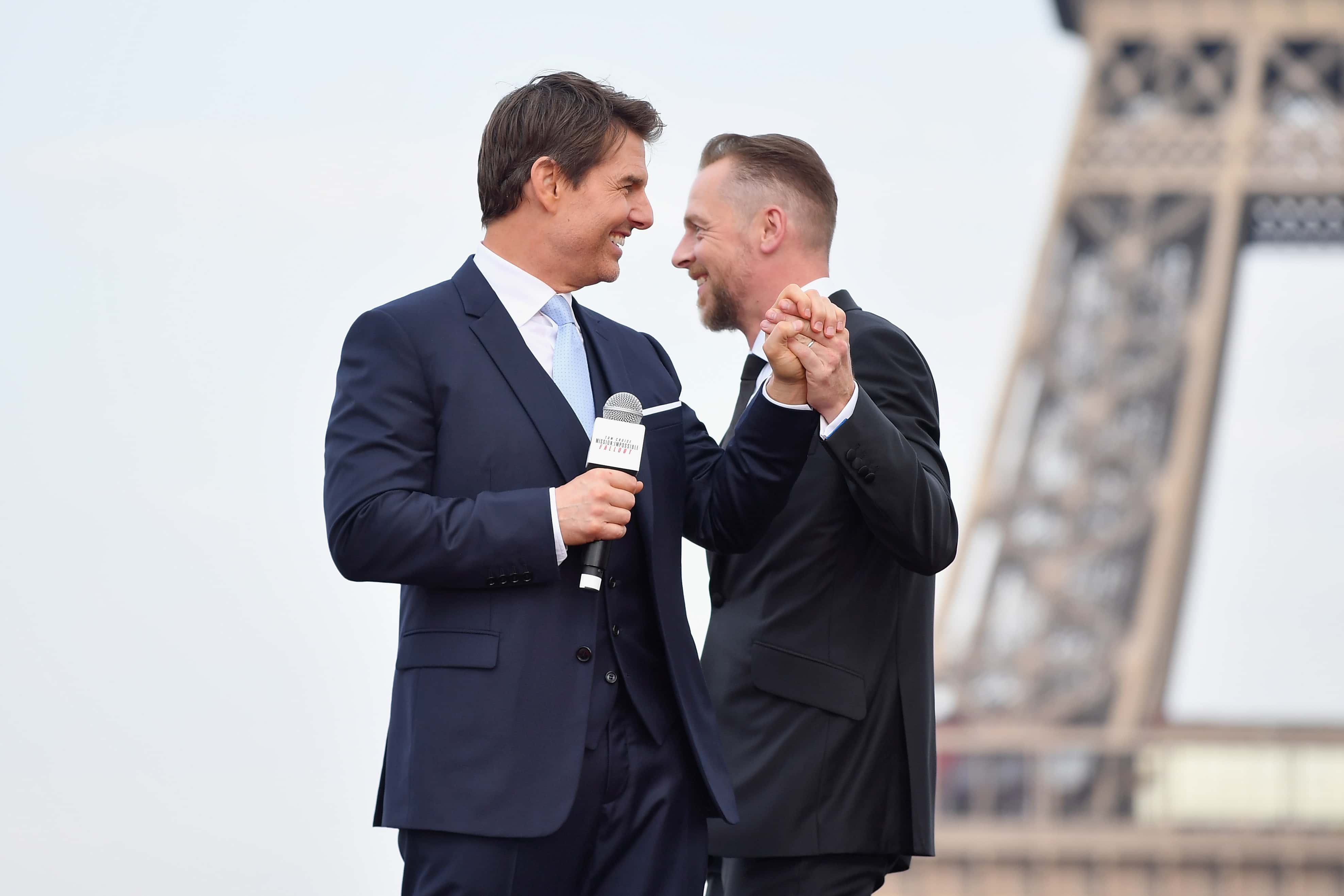 Tom Cruise and Simon Pegg attend the Global Premiere of 'Mission: Impossible - Fallout' at Palais de Chaillot on July 12, 2018 in Paris, France.