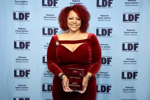 Honoree Nikole Hannah-Jones poses with the Spirit of Justice award backstage during the LDF 34th National Equal Justice Awards Dinner on May 10, 2022 in New York City.