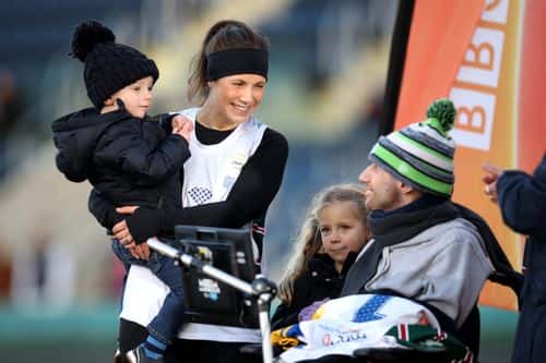 Rob Burrow gathers with his family after Ex-Leeds Rhinos rugby league player Kevin Sinfield completes his Extra Mile Challenge at Emerald Headingley Stadium on November 23, 2021 in Leeds, England. Sinfield aims to run 101 miles in 24 hours in aid of motor neurone disease research. (Photo by George Wood/Getty Images)