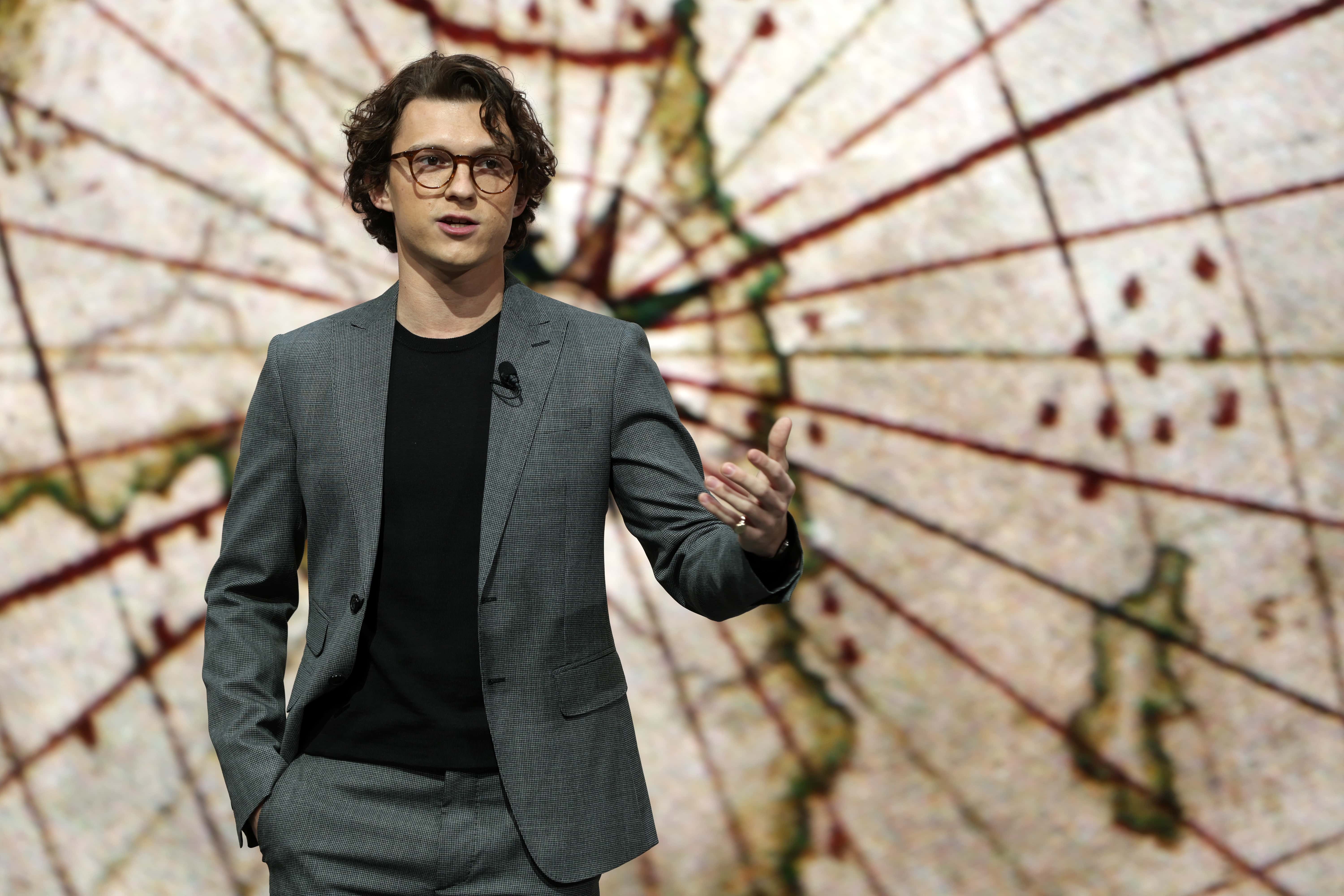 Tom Holland speaks during a Sony media event for CES 2022 at the Mandalay Bay Convention Center on January 4, 2022, in Las Vegas, Nevada. CES, the world's largest annual consumer technology trade show, is being held in person from January 5-7, with some companies deciding to participate virtually only or canceling altogether due to concerns over the recent surge in cases of the omicron variant of Covid-19. (Photo by Alex Wong/Getty Images)