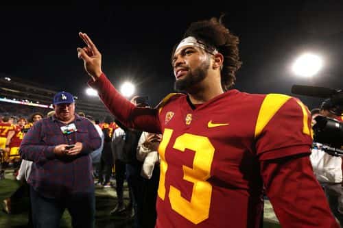 Caleb Williams #13 of the USC Trojans celebrates after defeating the UCLA Bruins in the game at Rose Bowl on November 19, 2022 in Pasadena, California. The USC Trojans defeated the UCLA Bruins with a score of 48 to 45.