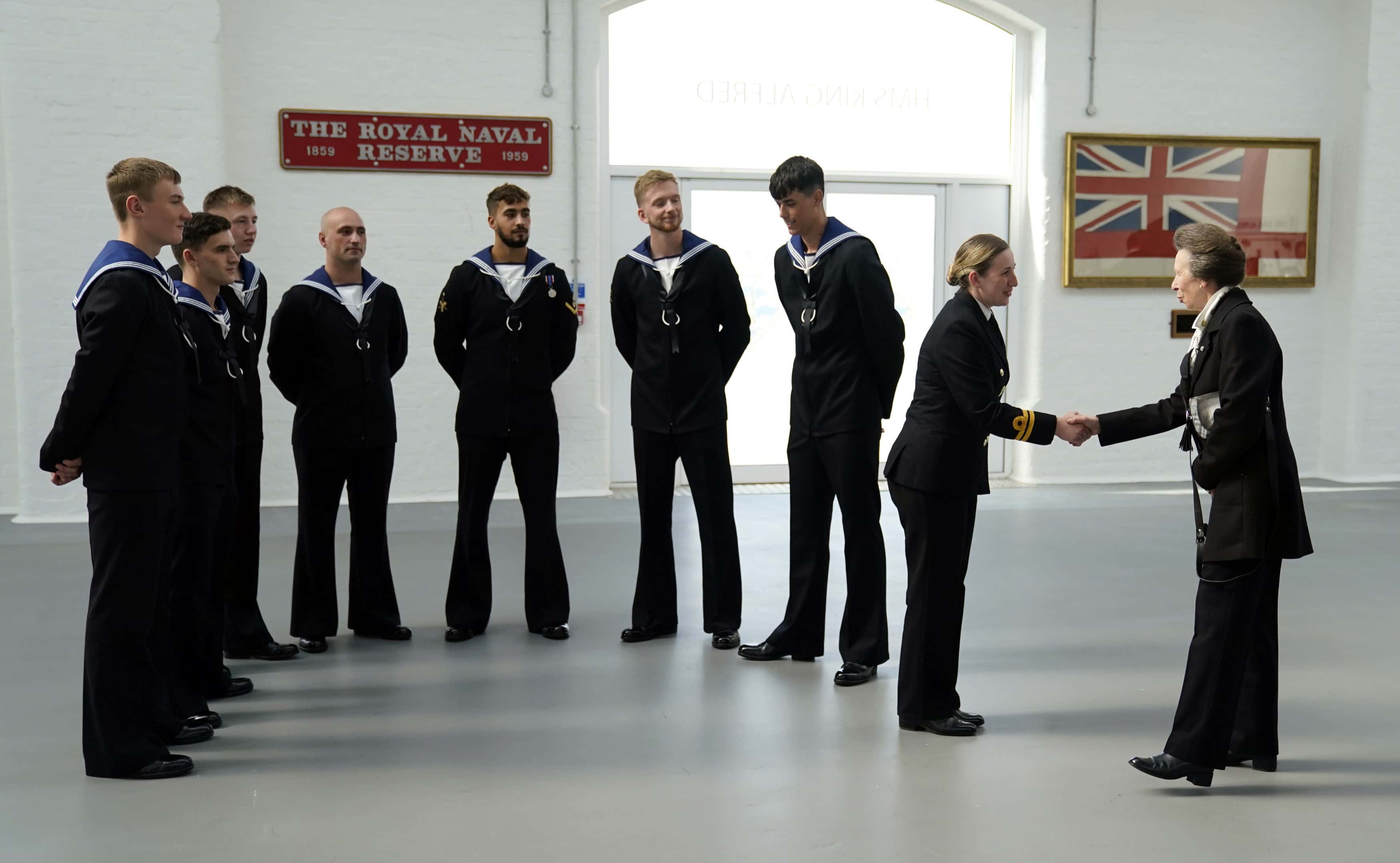 Princess Anne, Princess Royal, as Commodore-in-Chief Portsmouth, meets Royal Navy personnel as she visits Portsmouth Naval Base to meet and thank members of the armed forces involved in her Majesty Queen Elizabeth II's funeral on September 22, 2022 in Portsmouth, United Kingdom.