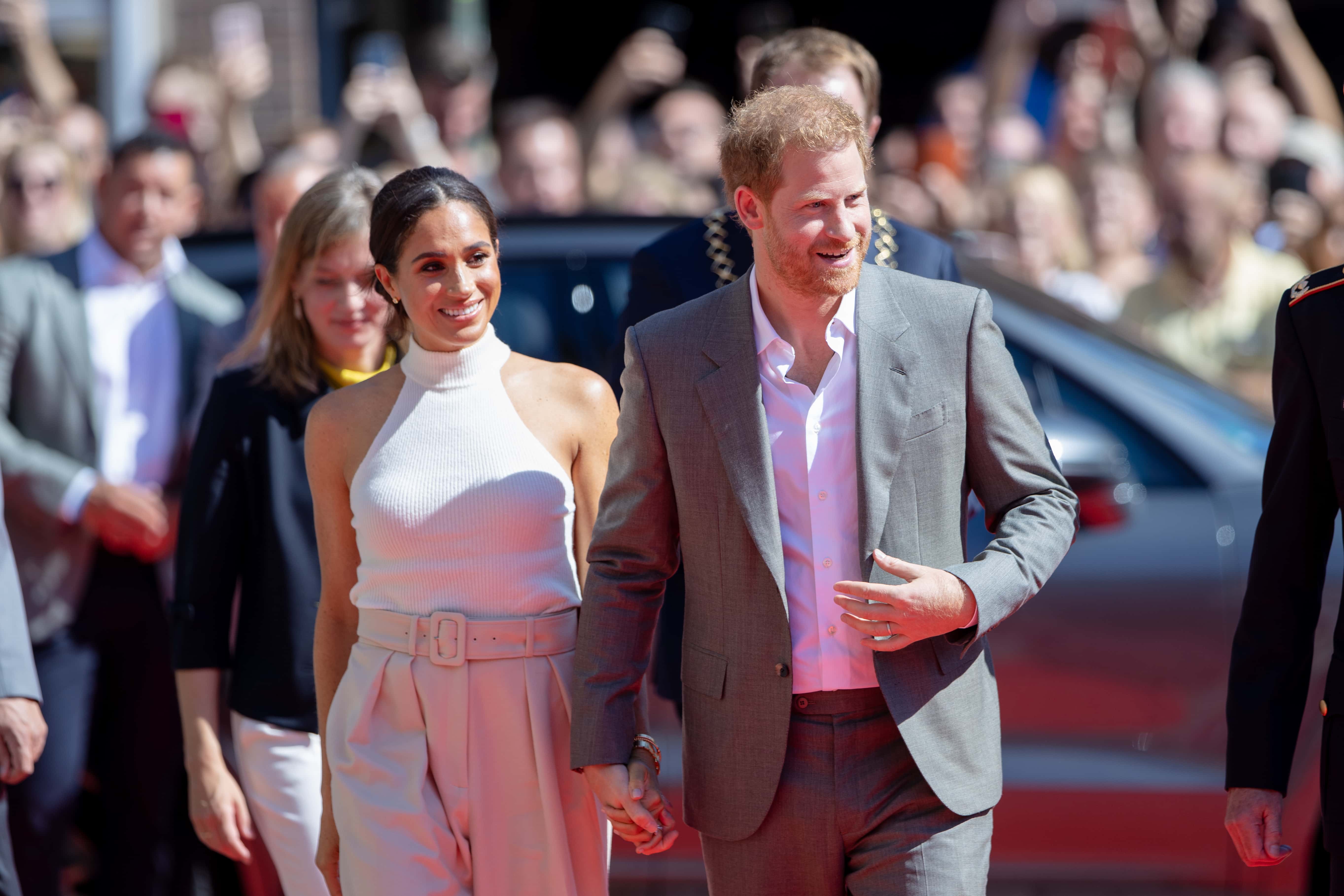 Meghan, Duchess of Sussex and Prince Harry, Duke of Sussex arrive at the town hall during the Invictus Games Dusseldorf 2023 - One Year To Go events, on September 06, 2022 in Dusseldorf, Germany. (Photo by Joshua Sammer/Getty Images for Invictus Games Dusseldorf 2023)