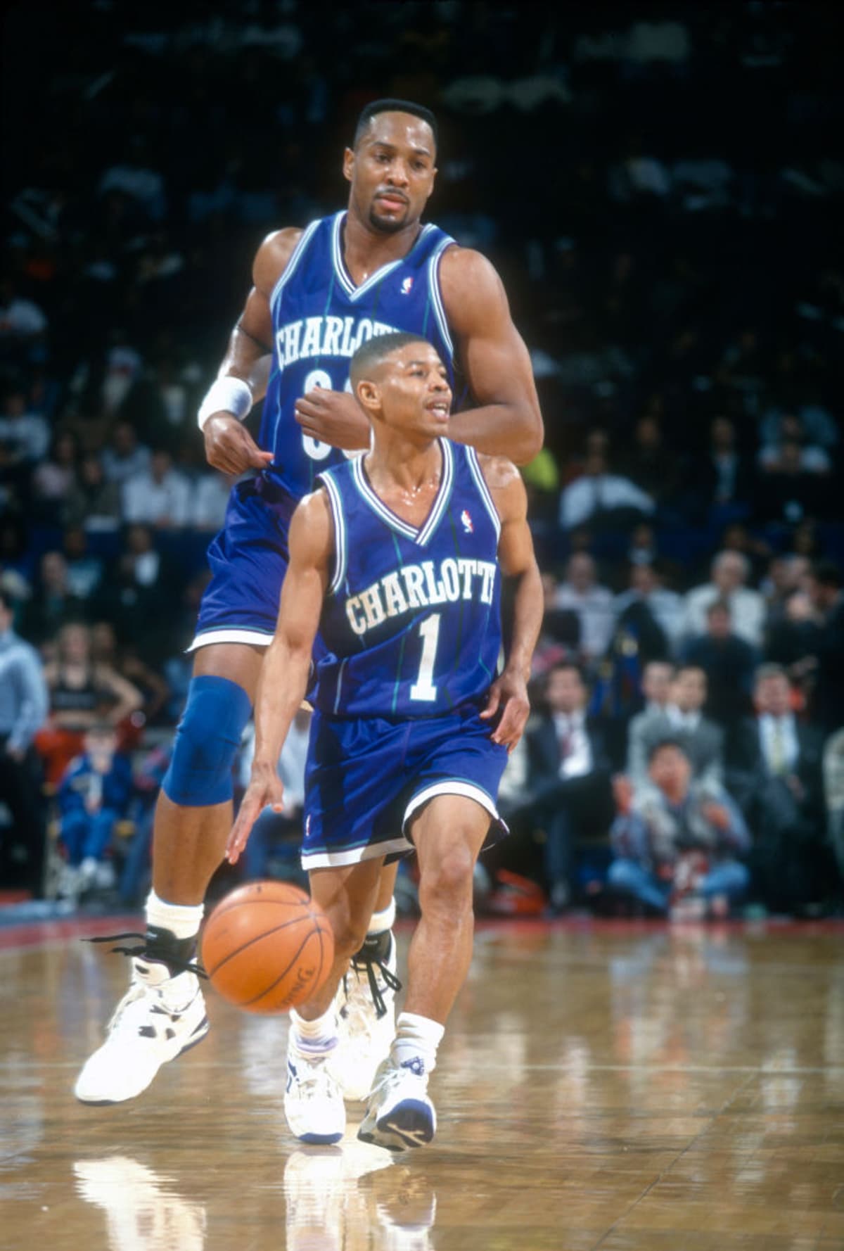 Golden State Warriors legend Muggsy Bogues poses for a photo at the third American Express 
