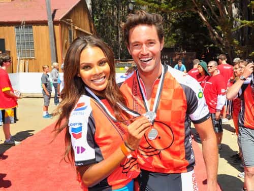 Crystle Stewart and Max Sebrechts wear their medals after crossing the finish line of the Best Buddies Challenge: Hearst Castle Rideon September 8, 2012 in San Simeon, California. (Photo by Steve Jennings/Getty Images For Best Buddies And Zenith)