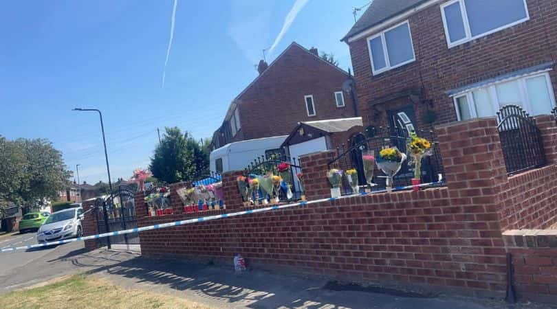 Bouquets of flowers were left outside Joanne's home (Facebook/Dillion Robinson)
