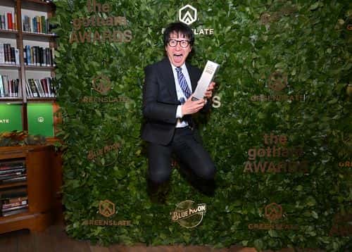 Ke Huy Quan poses with the Outstanding Supporting Performance Award in the GreenSlate Greenroom At The 2022 Gotham Awards at Cipriani Wall Street on November 28, 2022 in New York City.