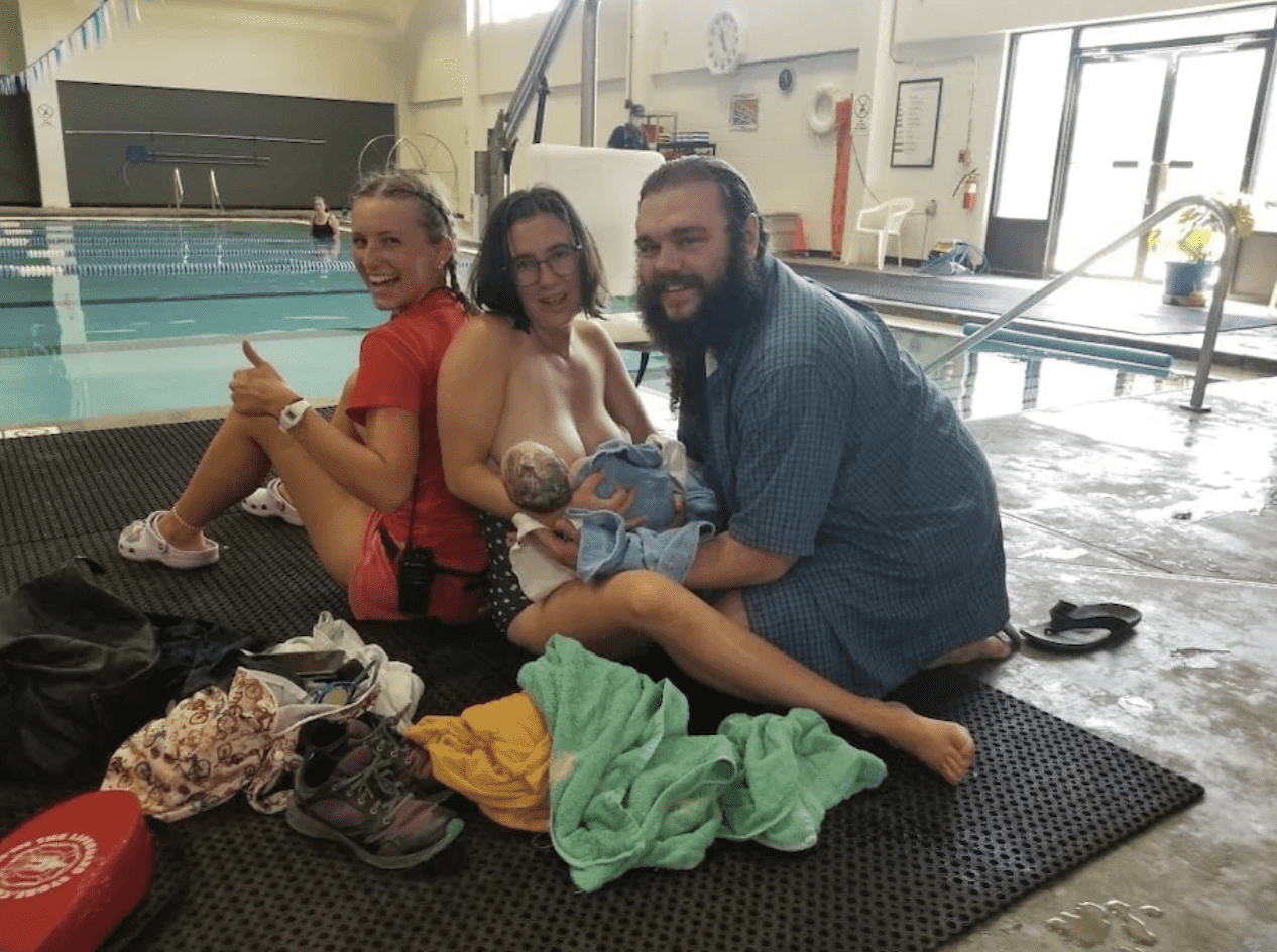 Lifeguard Natalie Lucas with the couple and the newborn baby Toby (Tessa Rider and Matthew Jones)