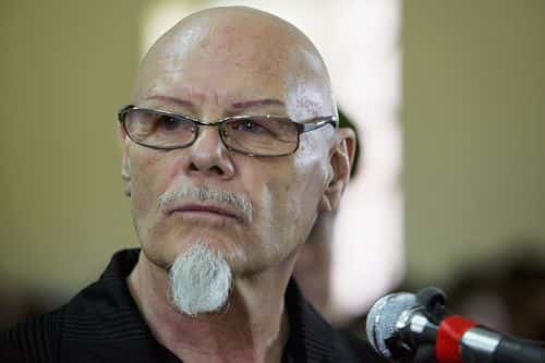 Former British Glam-Rocker, Gary Glitter, listens to the guilty verdict being read out at the People's Courthouse March 3, 2006 in Ba Ria, Vietnam. Glitter, age 61, is sentenced to three years in prison for commiting obscene acts with two underaged girls in Vietnam.