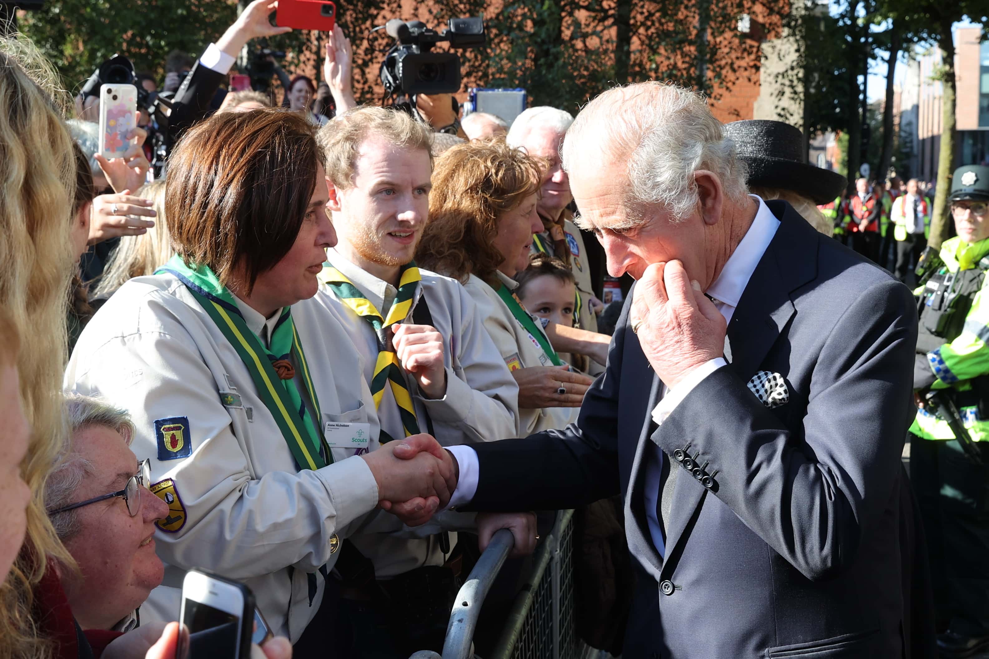 King Charles III and the Queen Consort meet members of the public on a walkabout in Writer's Square, during a Service of Reflection at St Anne's Cathedral on September 13, 2022 in Belfast, Northern Ireland. Charles and Camilla are visiting the four home nations of the UK in the run-up to the state funeral for Queen Elizabeth II on Monday. (Photo Liam McBurney - WPA Pool/Getty Images)