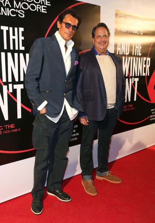 Geoffrey Moore (L) and Jon Lovitz attend the premiere of