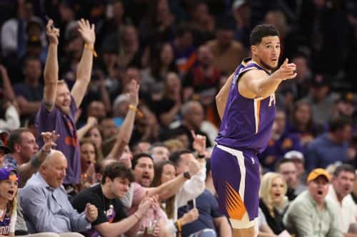 Devin Booker #1 of the Phoenix Suns reacts to a three-point shot against the Oklahoma City Thunder during the first half of the NBA game at Footprint Center on March 08, 2023 in Phoenix, Arizona. (Photo by Christian Petersen/Getty Images)
