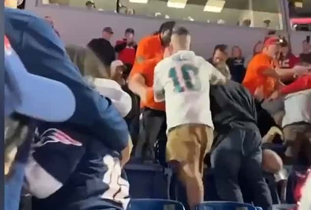 Medics administering CPR a short time afterwards as worried fans watched on (NBC Boston)