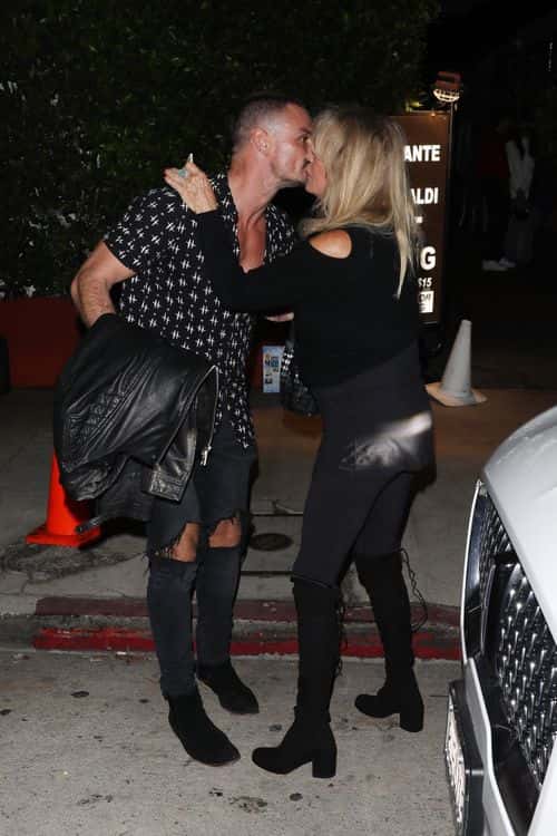 Goldie Hawn gets a hug and a kiss goodbye after having dinner with a friend at Italian restaurant Giorgio Baldi in Santa Monica (Backgrid)
