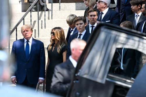Former President Donald J. Trump, Melania Trump, and Barron Trump exit the funeral of Ivana Trump at St. Vincent Ferrer Roman Catholic Church July 20, 2022 in New York City. Ivana Trump, the first wife of former president Donald Trump, &nbsp;died at the age of 73 after a fall down the stairs of her Manhattan home.