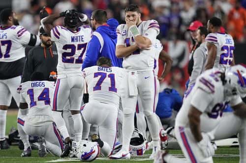 Josh Allen #17 of the Buffalo Bills reacts after teammate Damar Hamlin #3 collapsed following a tackle against the Cincinnati Bengals during the first quarter at Paycor Stadium on January 02, 2023 in Cincinnati, Ohio.