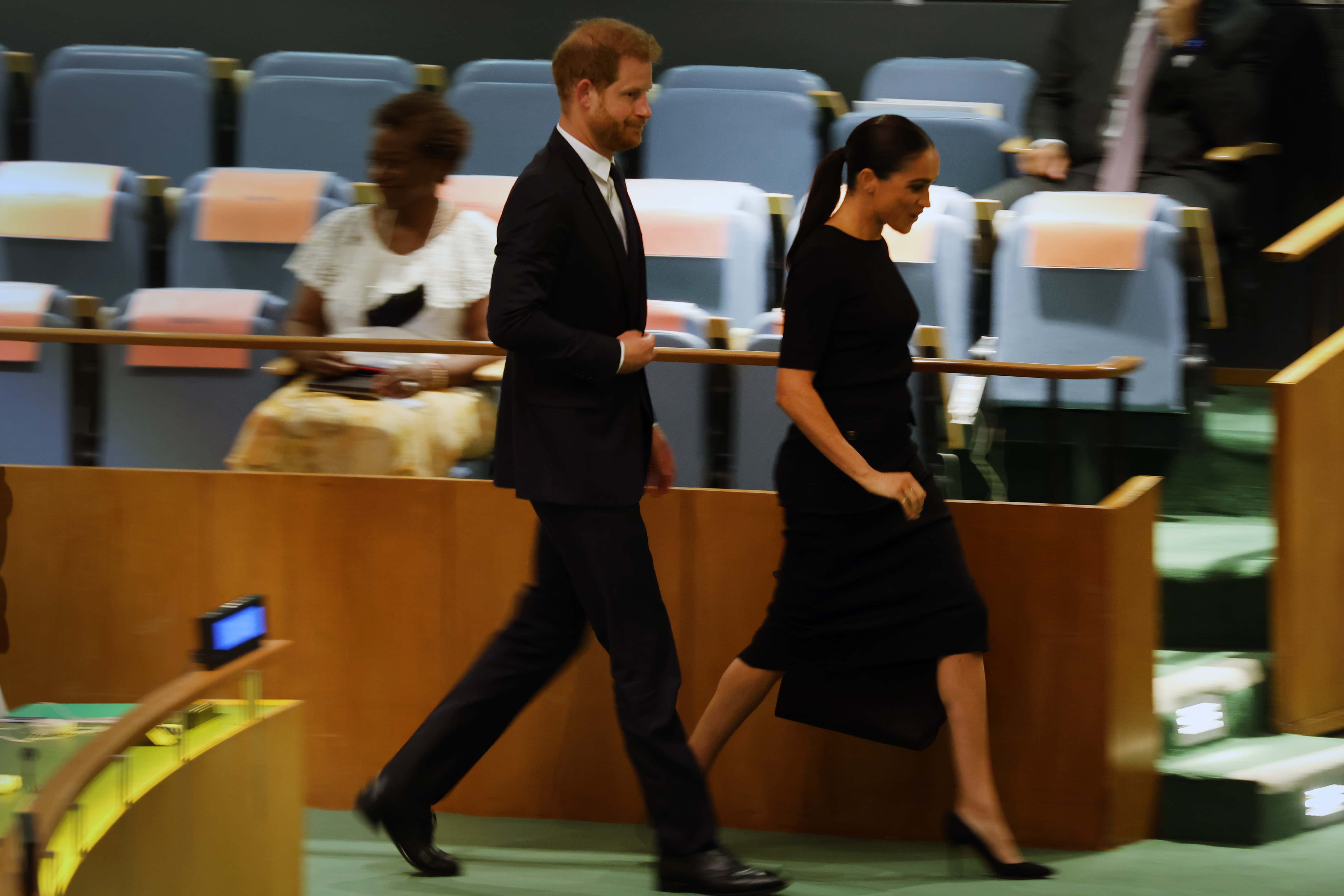 Prince Harry and his wife Meghan Markle depart after the Prince addressed the United Nations (UN) general assembly during the UN's annual celebration of Nelson Mandela International Day on July 18, 2022 in New York City. The Prince, the keynote speaker, will speak about the legacy and inspiration of the South African anti-apartheid leader who spent 27 years in a remote South African prison before becoming the president and first black leader of the country. The 37-year-old Duke of Sussex attended the event with his wife Meghan Markle. (Photo by Spencer Platt/Getty Images)