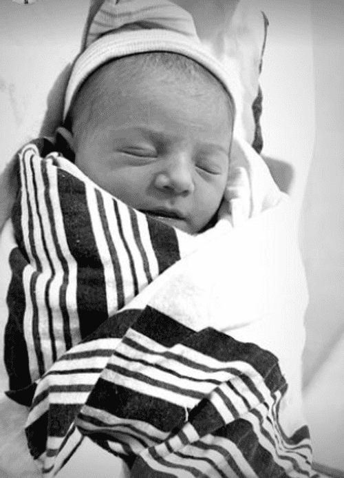 han Thompson captioned the snap, 'Wylder Rayne 3/21/23,' while adding another snap of the newborn wrapped up in blankets (Instagram/@nathanthompson)